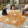 Petaline Burnt Orange and White Outdoor Rug